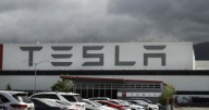 Tesla under investigation after parents say faulty door handles trapped their kids in the back