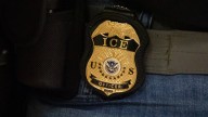 DHS says federal agent on leave after pushing woman to floor
