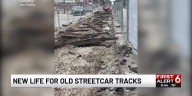 Future Omaha streetcar construction uncovers past streetcar rails
