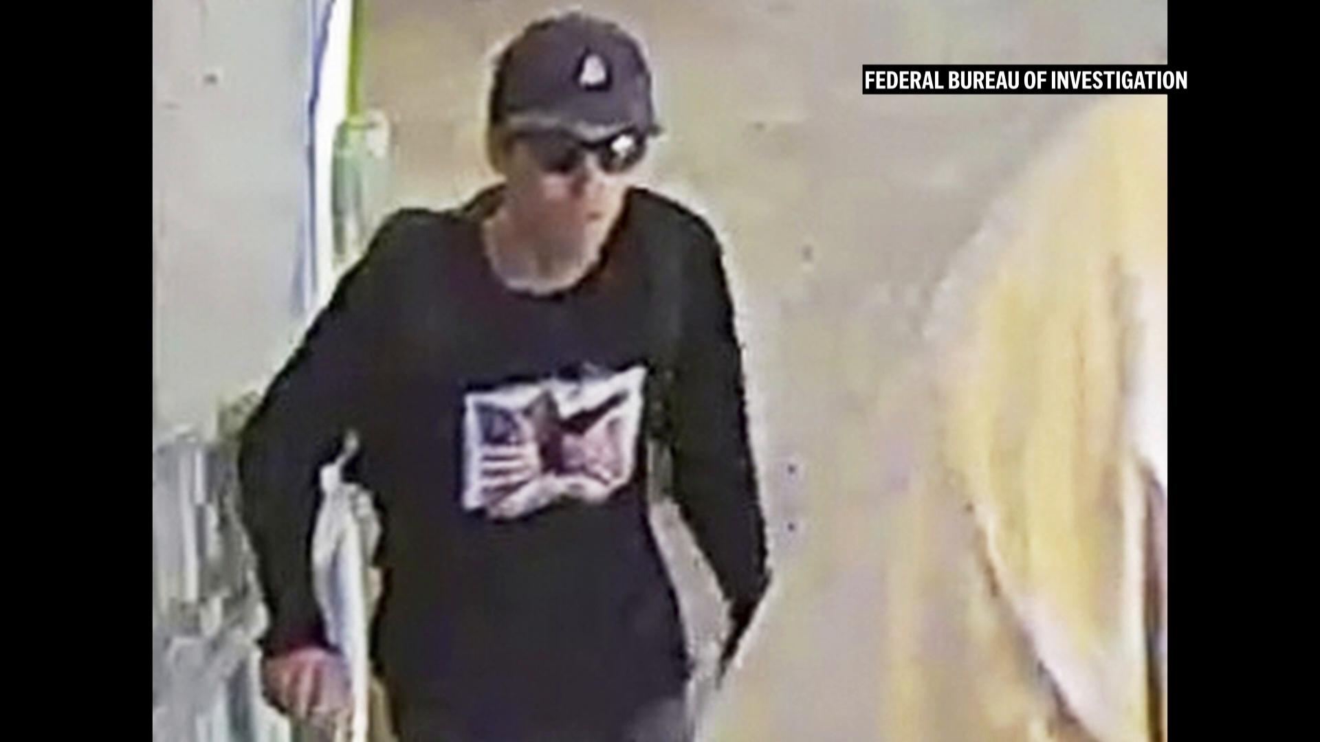 FBI release photos of person of interest in Kirk shooting and offer $100k reward