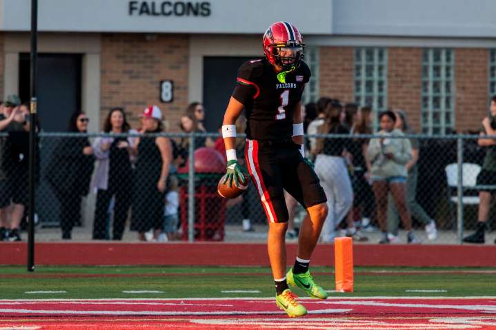 Photos: Divine Child football sweeps Ypsi Community for third straight shutout