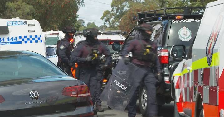 Berala stabbing: Man arrested after hour-long siege, stabbing in western Sydney
