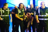 Climate protesters removed from Reform conference after heckling Nigel Farage