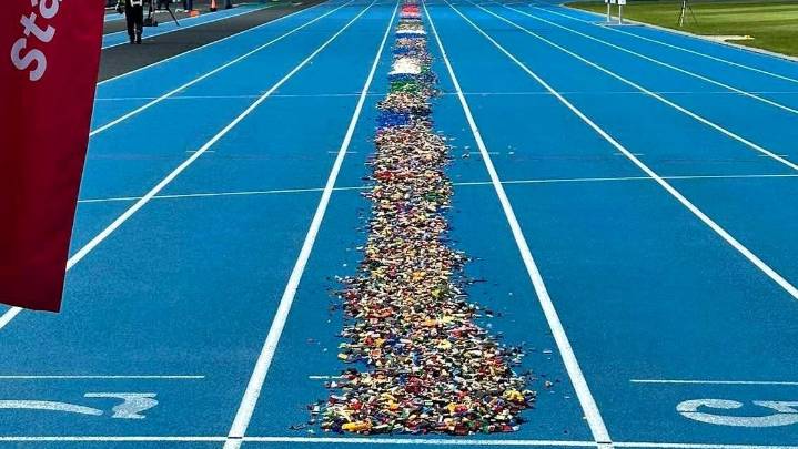 Health scare leads mom to world record: Barefoot run on Lego bricks. On purpose