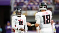 Falcons won't consider a change from Michael Penix to Kirk Cousins