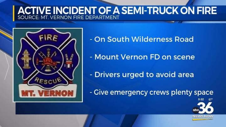 Crews working on an active burning semi