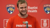 Florida captain Aleksander Barkov needs help getting off ice after apparent leg injury