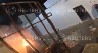 Dramatic POV footage shows moment armed cops storm Ecuadorian prison to CRUSH brutal riot that left at least 14 dead