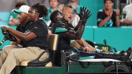Miami Dolphins beat New York Jets for first win of NFL season but lose star man Tyreek Hill to injury