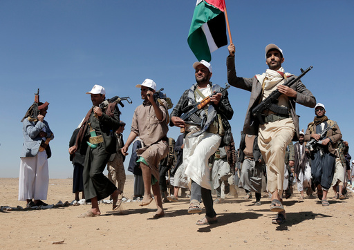 Vessel ablaze in Gulf of Aden off Yemen after being struck by a projectile, UK military says