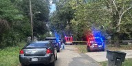 Woman shot while inside home on Boone Street