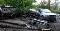'The guy barely hung on when the the mud came through.' Rain, mudslides batter SoCal mountain towns.