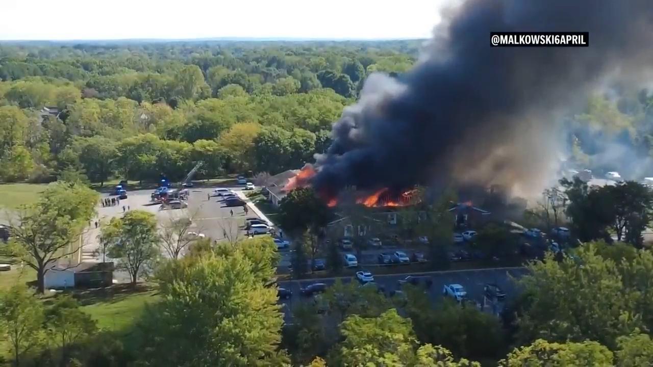 Police say suspect drove car into Michigan church, carried out deadly shooting, set building ablaze