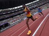 Athletics-Simbu snatches marathon gold from Petros at the line
