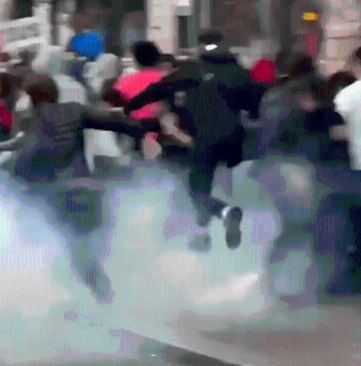 Fried chicken giveaway sparks CHAOS in Paris as riot cops fire tear gas at 3,000