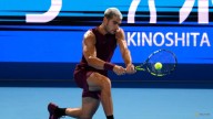 Alcaraz survives injury scare to beat Baez on Tokyo debut