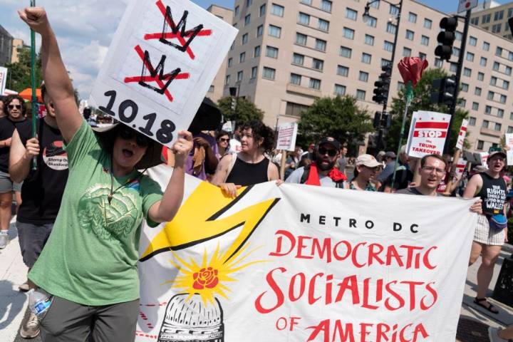 Thousands protest for a 'Free DC' on the fourth week of federal control in Washington