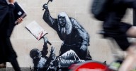 New Banksy mural removed a day after appearing on courthouse