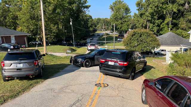 Two found dead in front yard of Greenville County home