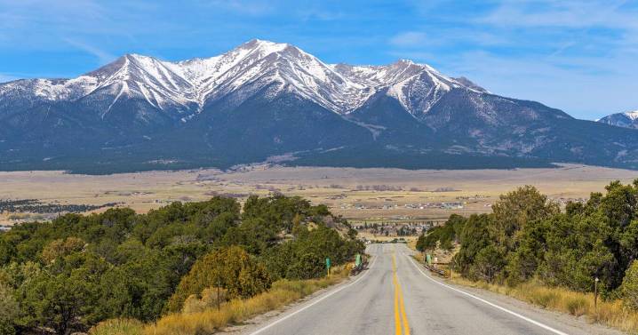 Rescue teams carry dog down Mt. Princeton