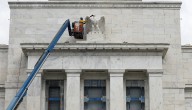 Federal Reserve cuts key rate by quarter-point, signals two more cuts this year