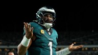 Jalen Hurts scores second rushing TD as Eagles tie Cowboys 14