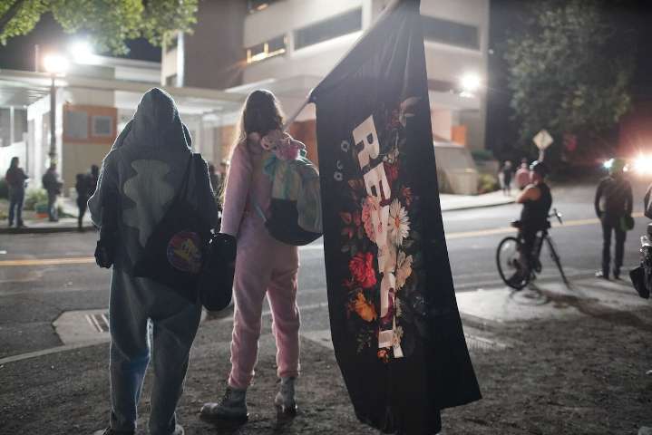 Protest outside Portland ICE reflects tension over Trump’s troop declaration