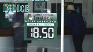 Peso pierde por fortalecimiento de la economía de Estados Unidos