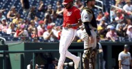 Wood scores on Cruz's 11th outfield error, Nationals overcome 3