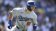 Dodgers’ Dalton Rushing helped off the field in first start following Will Smith injury