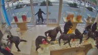 Video: Dozens of masked Calif. robbers smash cases, take off with jewelry