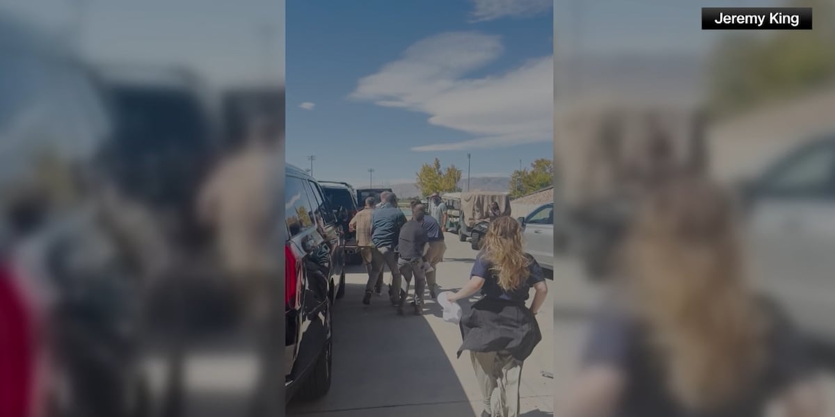 GRAPHIC: Video shows Charlie Kirk being rushed to SUV after he was shot, crowd running in chaos