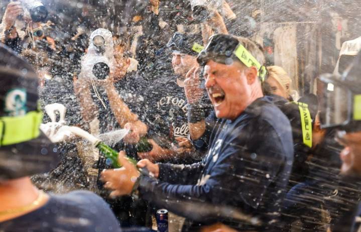Photos: Mariners clinch playoff berth with win over Rockies