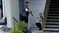 Horror moment crazed husband blasts ex wife three times with shotgun killing her on hospital staircase as patients flee