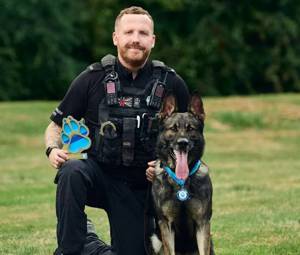 Police K-9 saves handler from shovel