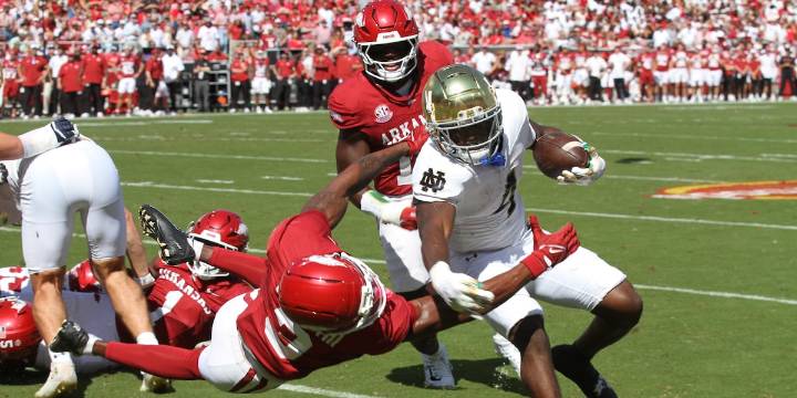 CJ Carr matches freshman record with 4 TD throws as No. 22 Notre Dame routs Arkansas