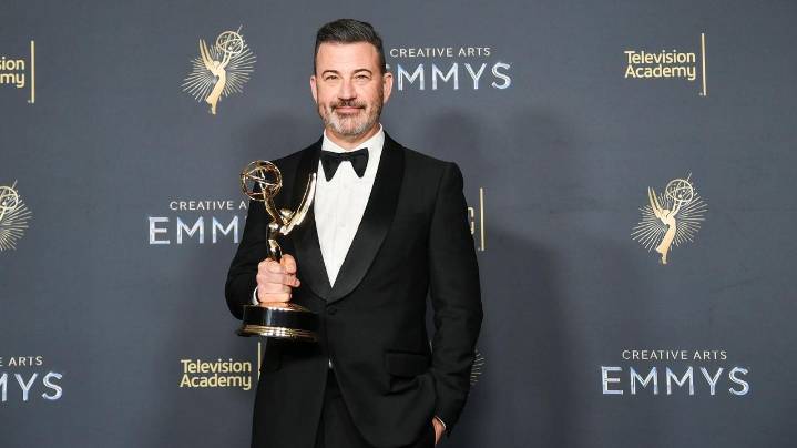 Jimmy Kimmel says he's not defending democracy. But he's standing up for fellow Emmy nominee Colbert