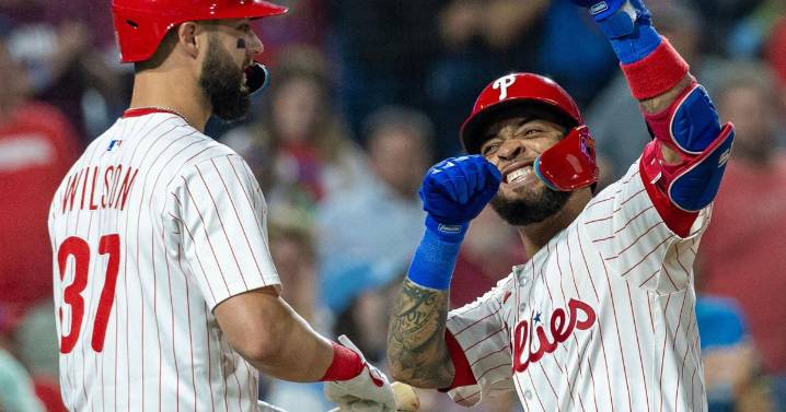 Phillies wrap up a 1st-round bye, hitting a team-record 8 homers to rout the Marlins
