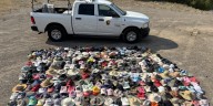Yellowstone National Park shows off hundreds of hats blown into thermal pools this year