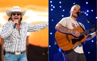 Country music star climbs barbed wire fence to confront musician as feud continues