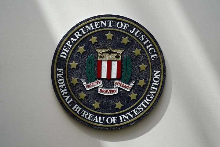 Two arrested in Utah after bomb found under news media vehicle