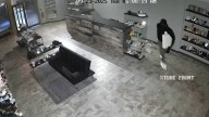 Surveillance video shows small business hit by smash