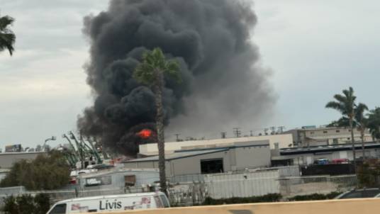 Fire erupts in building off I