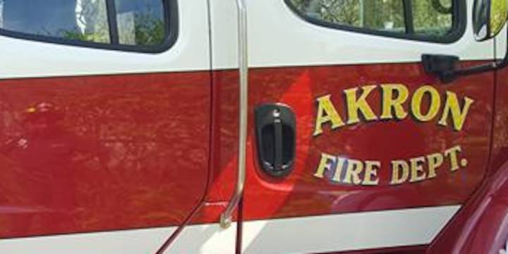 Neighbor rescues pregnant woman from 2nd story window during Akron house fire
