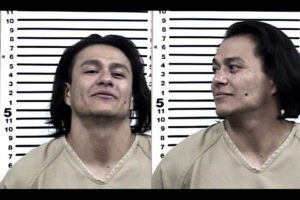 Man arrested for allegedly attacking neighbors, hitting woman with an air compressor