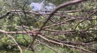 National Weather Service surveys damage of brief but damaging tornado in Mass. town