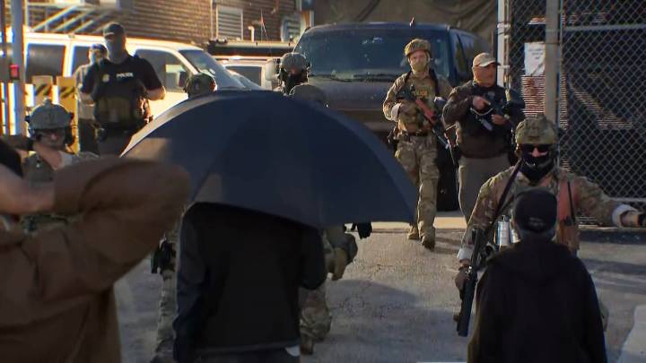 Armed ICE guards, protesters clash outside Broadview facility