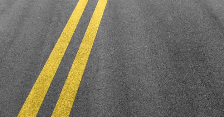 Driver hits parked camper on northern Minnesota highway, injuring woman who was checking it