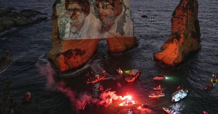 Photos show Hezbollah supporters honoring slain leaders Nasrallah and Safieddine despite PM's ban