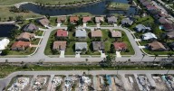 What’s causing home insurance costs to go up? Depends on who you ask